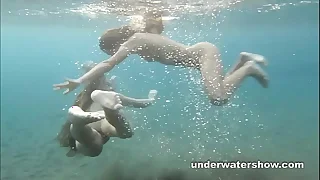 Julia with an increment of Masha are swimming undress in the sea